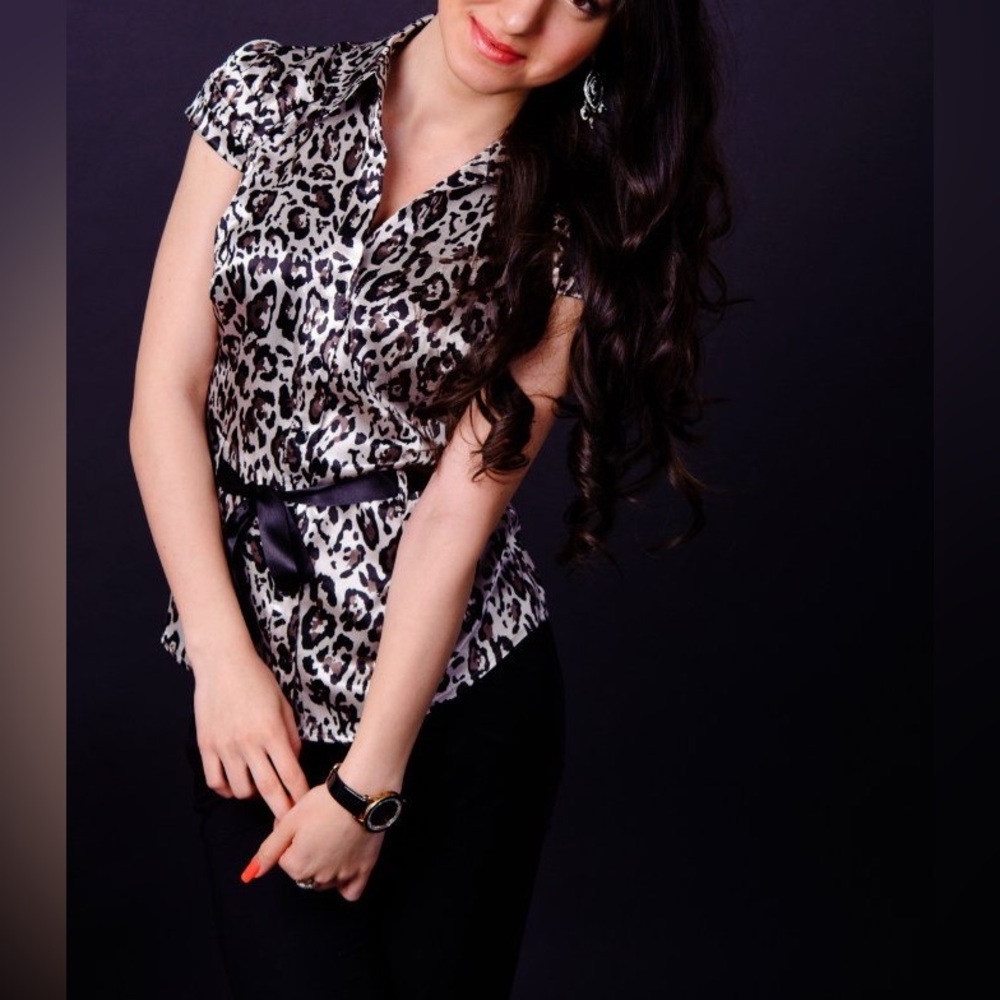 leopard print blouse in size Small.